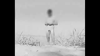 Huge output cock at a German nude beach